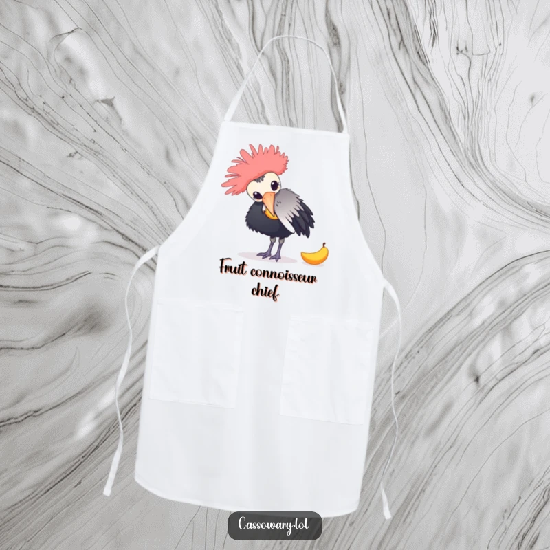 Funny apron featuring a cassowary playfully nudging a fallen mango, perfect for adding humor to cooking and baking.