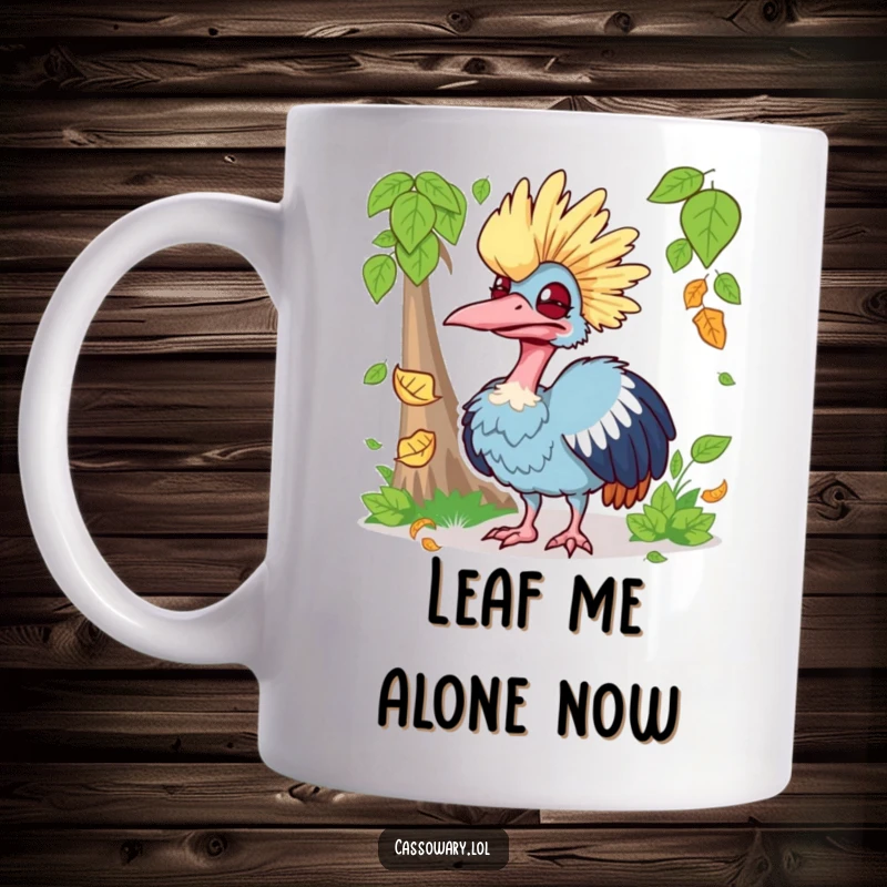 Funny mug showing a cassowary making a silly, exaggerated face while attempting to catch a falling leaf.
