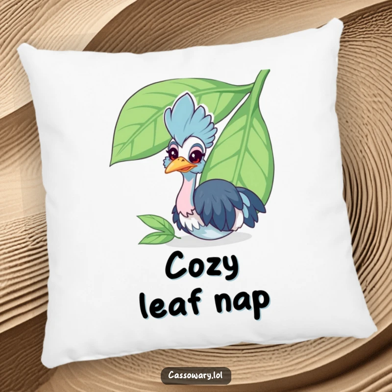 Funny cassowary pillow showcasing a cheerful bird peeking from behind a large leaf, providing comfort with a humorous and charming bird design.