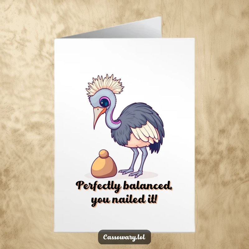 Funny free printable congratulations card: A cassowary teeters while trying to balance a small, colorful pebble, symbolizing achieved balance.