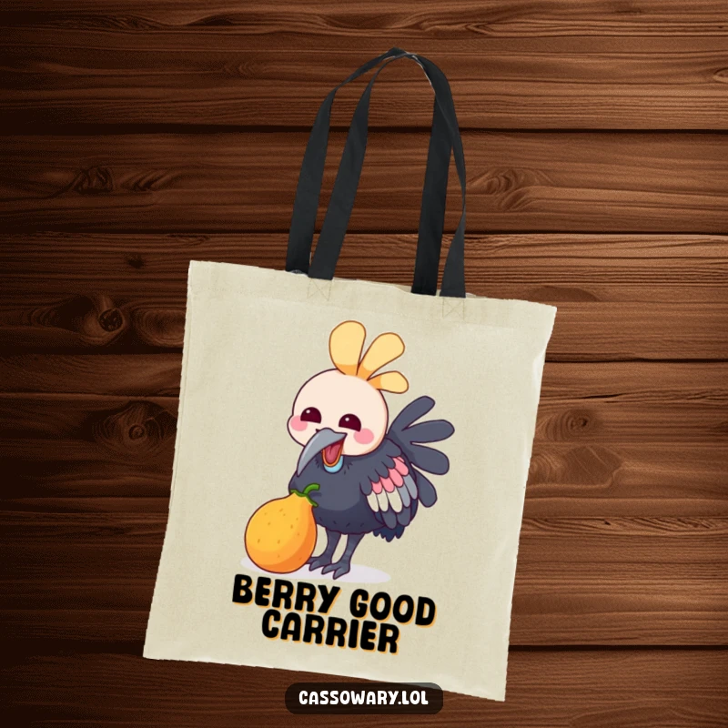 Funny tote bag with a kawaii cassowary joyfully pecking at a colorful fruit, perfect for carrying essentials with a touch of sweet humor.