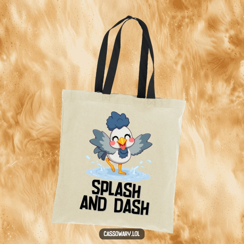 Funny tote bag depicting a cassowary joyfully splashing in a puddle, perfect for carrying items and spreading good vibes.