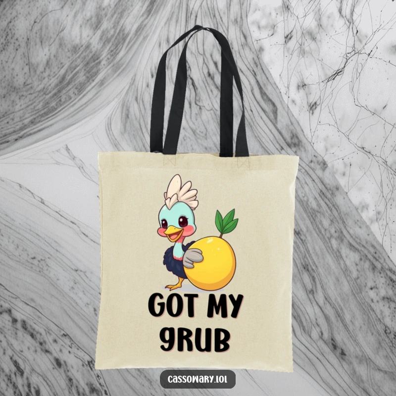 Funny Cassowary Fruit Nudge Tote Bag: A smiling cassowary playfully nudging a large fruit, perfect for carrying groceries. A funny gift.